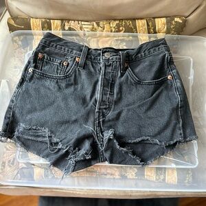 Size 25 Levi black distressed shorts